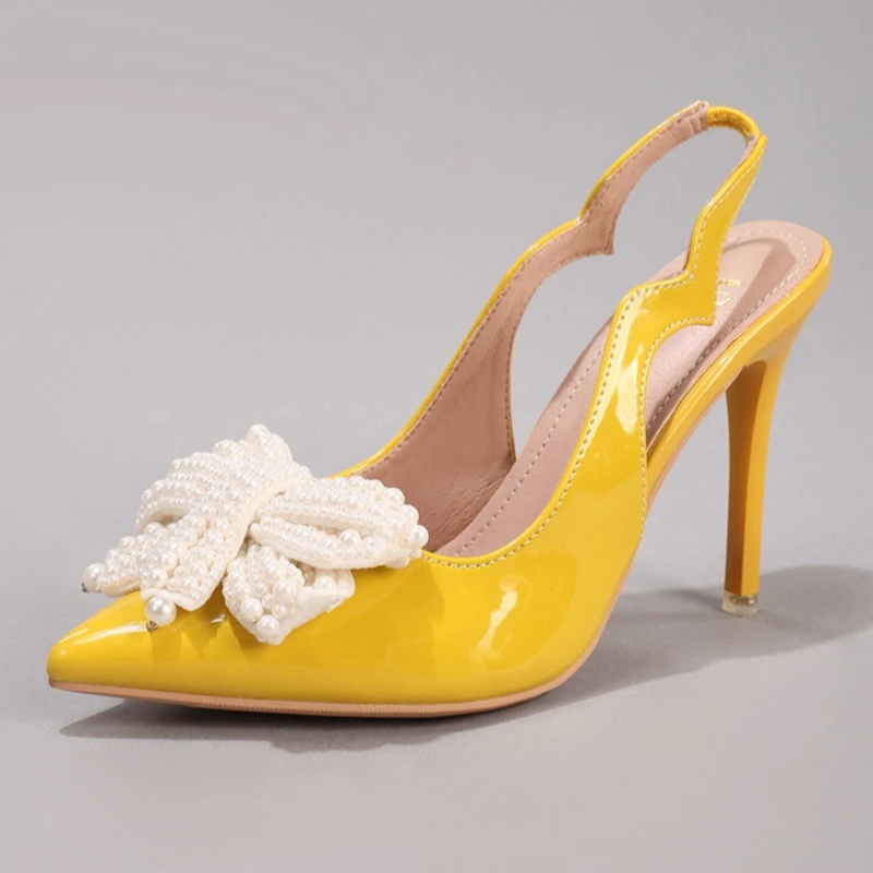 Novelty White Pearl Bow Decoration Elegant High Heels Wedding Bridal Shoes Women Sexy Pointed Toe Backless Designer Dress Pumps
Novelty White Pearl Bow Decoration Elegant High Heels Wedding Bridal Shoes Women Sexy Pointed Toe Backless Designer Dress Pumps