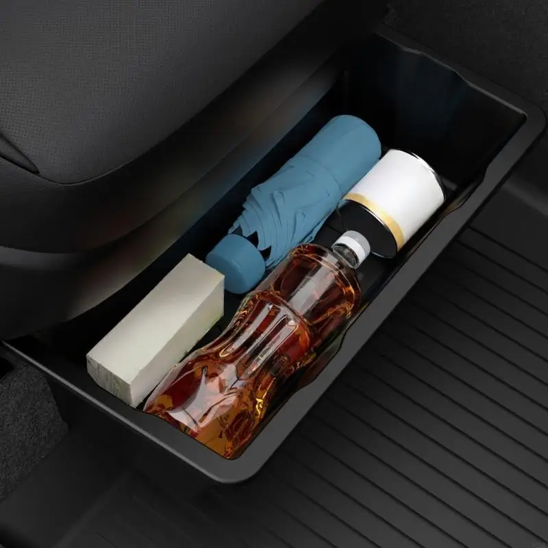 Под организатором хранения сидений для подножки для центральной консоли в 2025 году.
Под организатором хранения сидений для подножки для центральной консоли в 2025 году.