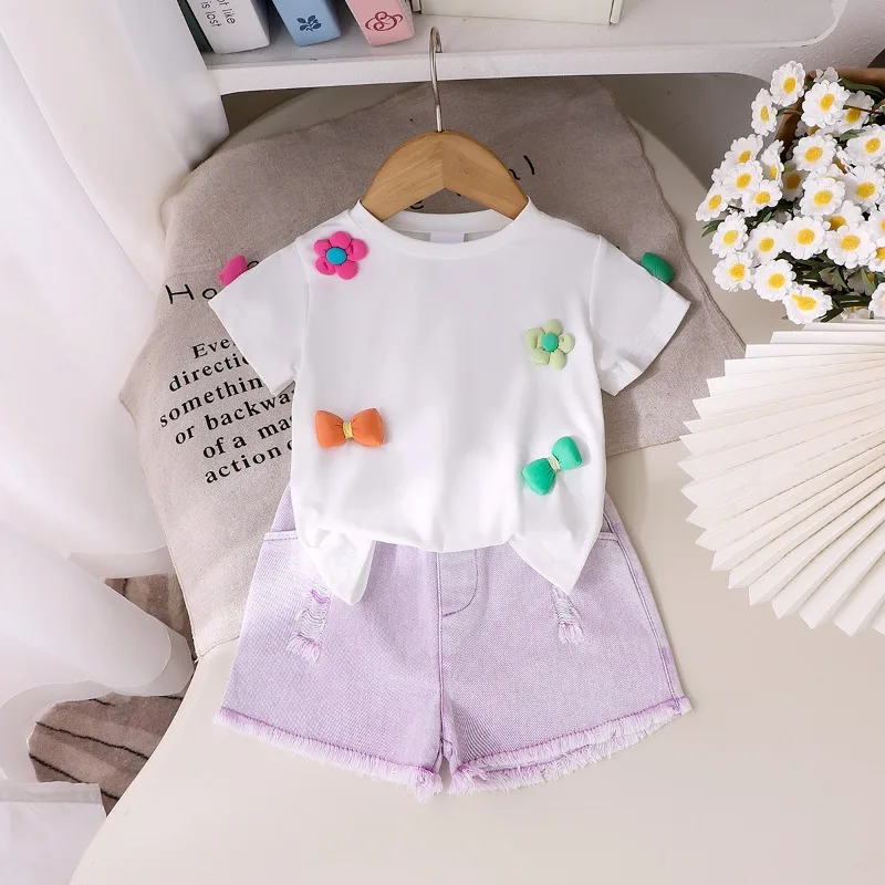 Children's clothing 2025 Fashion new white short-sleeved T-shirt + purple shorts 2-piece set for girls summer
Children's clothing 2025 Fashion new white short-sleeved T-shirt + purple shorts 2-piece set for girls summer