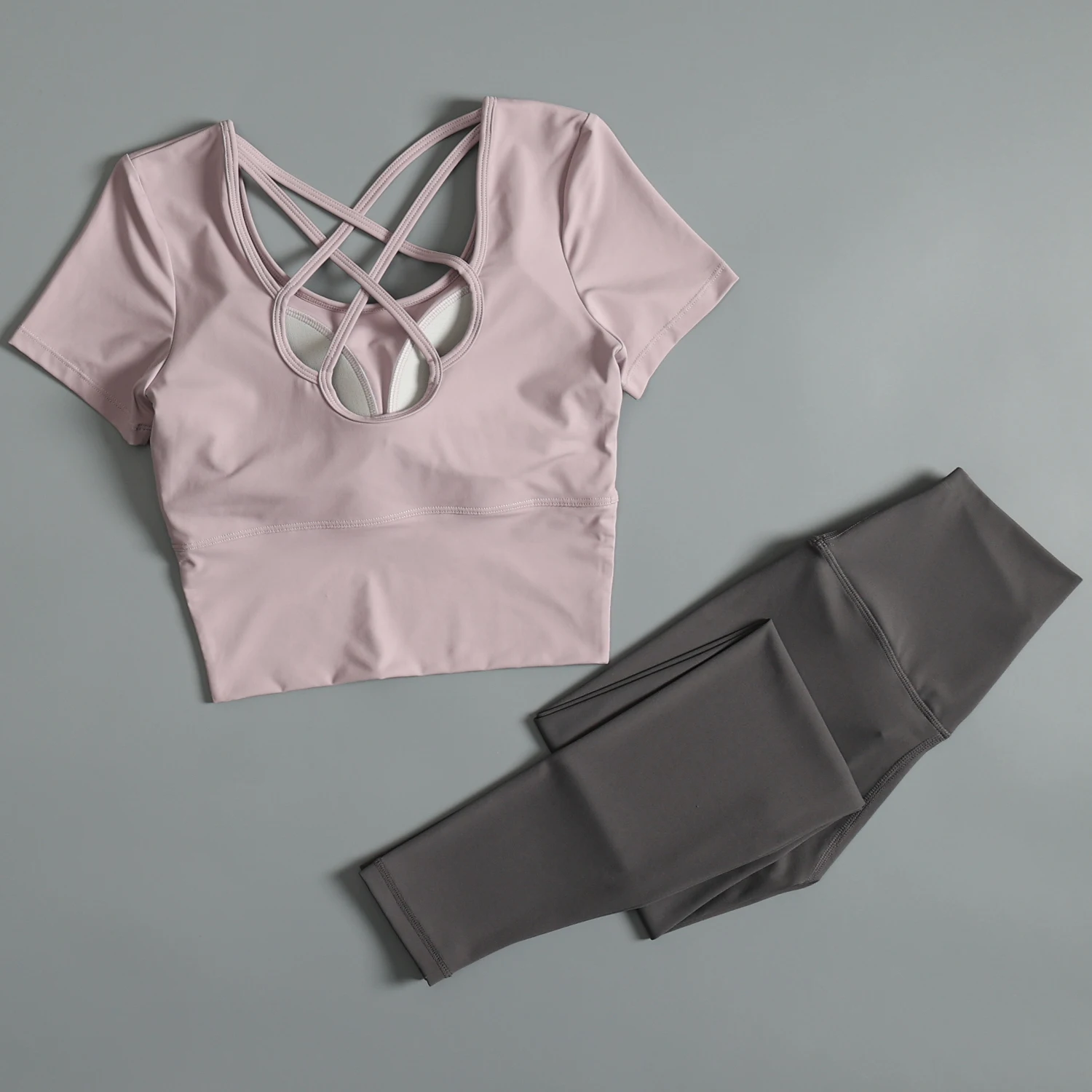 Yoga suits for women 2025 new short-sleeved Pilates training suit set beautiful fitness suit with chest pad sports top
Yoga suits for women 2025 new short-sleeved Pilates training suit set beautiful fitness suit with chest pad sports top