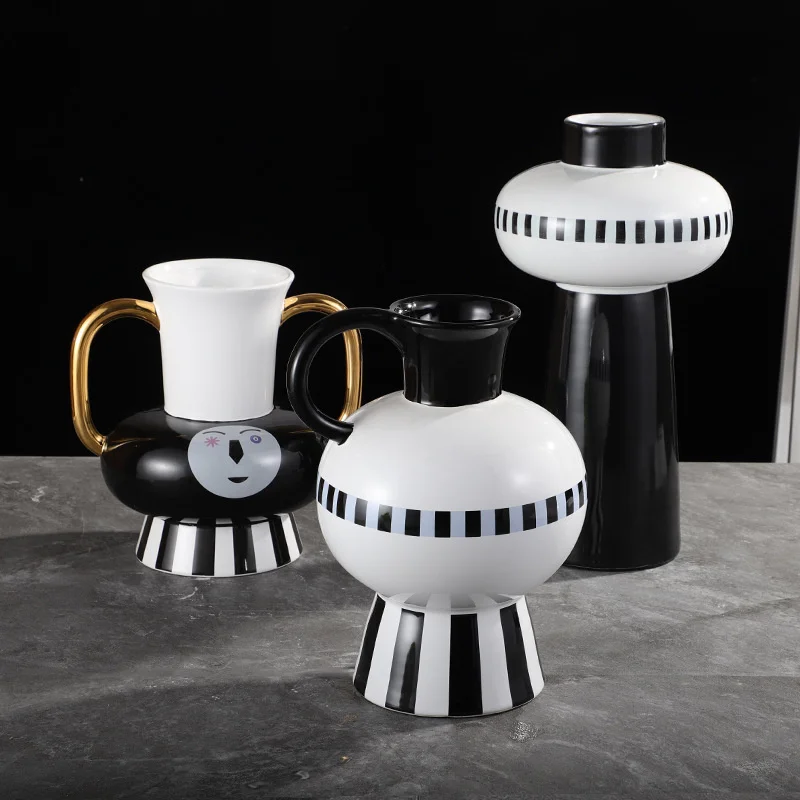 Light luxury modern black-and-white pattern binaural ceramic vases, flower utensils, soft decorations in Nordic home model room,
Light luxury modern black-and-white pattern binaural ceramic vases, flower utensils, soft decorations in Nordic home model room,