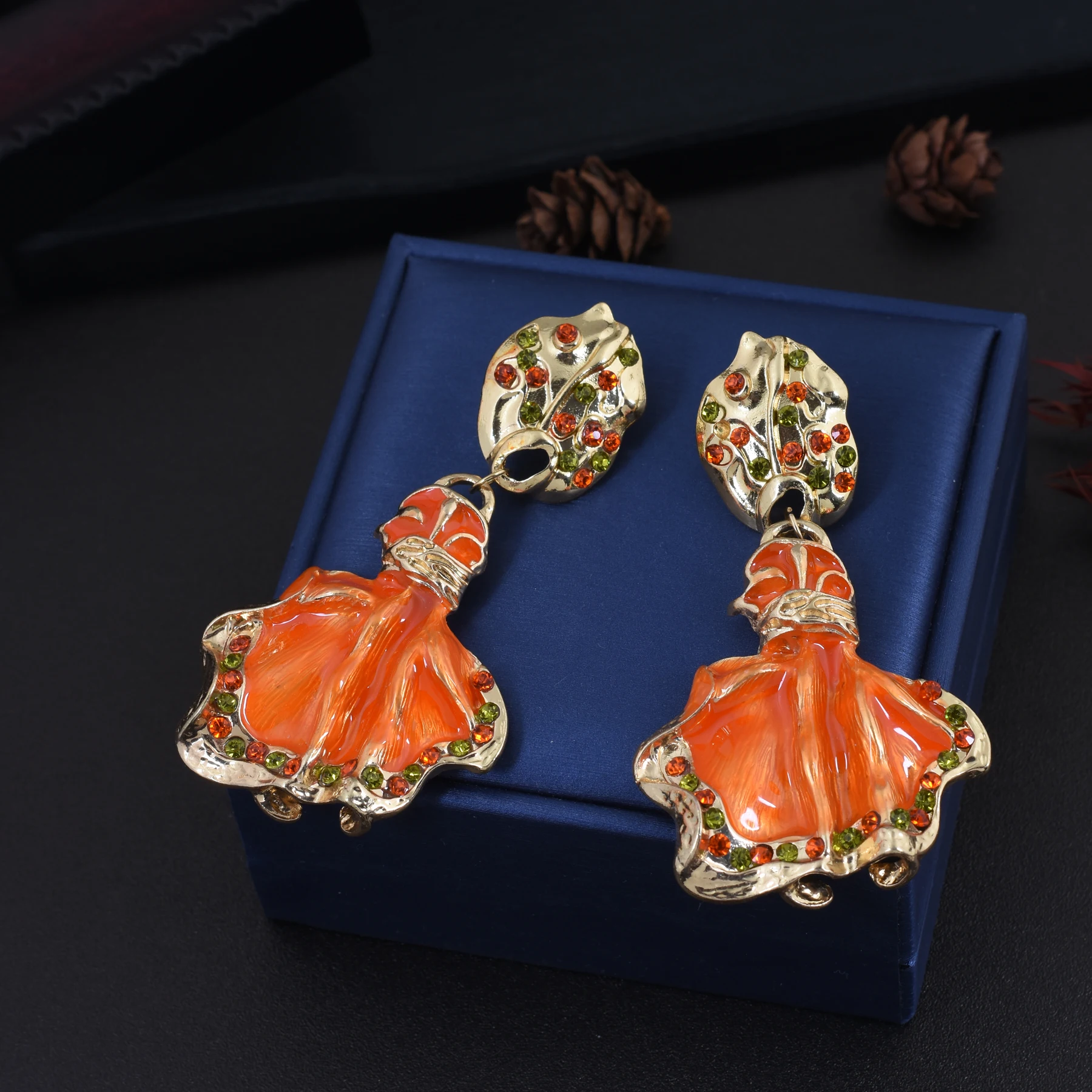 Middle vintage niche unique vintage style design earrings orange colored glass earrings 925 silver needle earrings female
Middle vintage niche unique vintage style design earrings orange colored glass earrings 925 silver needle earrings female