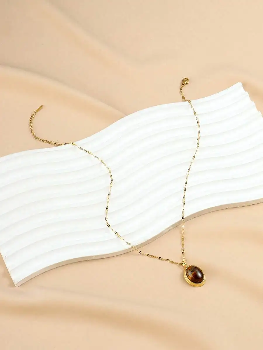 Stainless Steel Vintage Gold Tone Pendant Necklace With Brown Gemstone For Women
Stainless Steel Vintage Gold Tone Pendant Necklace With Brown Gemstone For Women