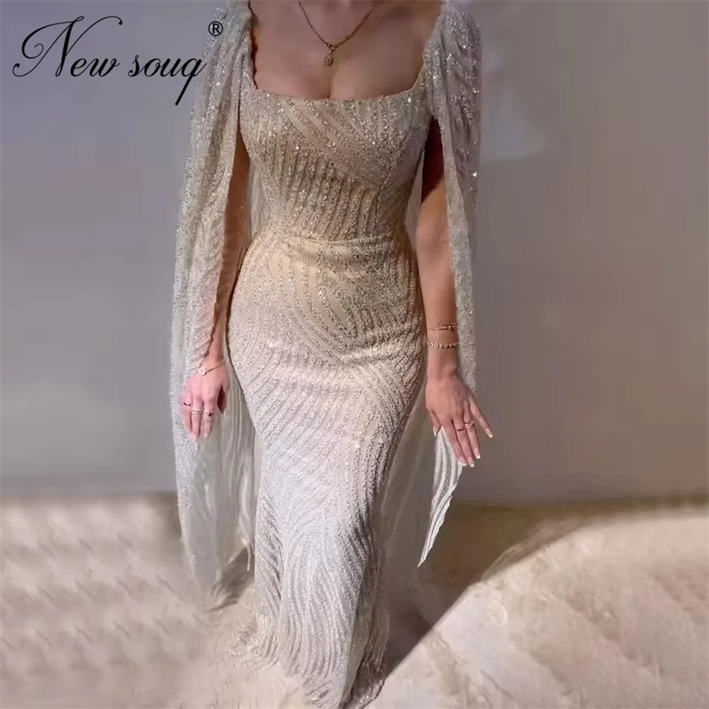 Арабские длинные вечерние платья цвета шампань с рукавами-накидками, элегантные, с блестками и пайетками, на заказ, фасон «русалка», для свадеб и вечеринок
Арабские длинные вечерние платья цвета шампань с рукавами-накидками, элегантные, с блестками и пайетками, на заказ, фасон «русалка», для свадеб и вечеринок