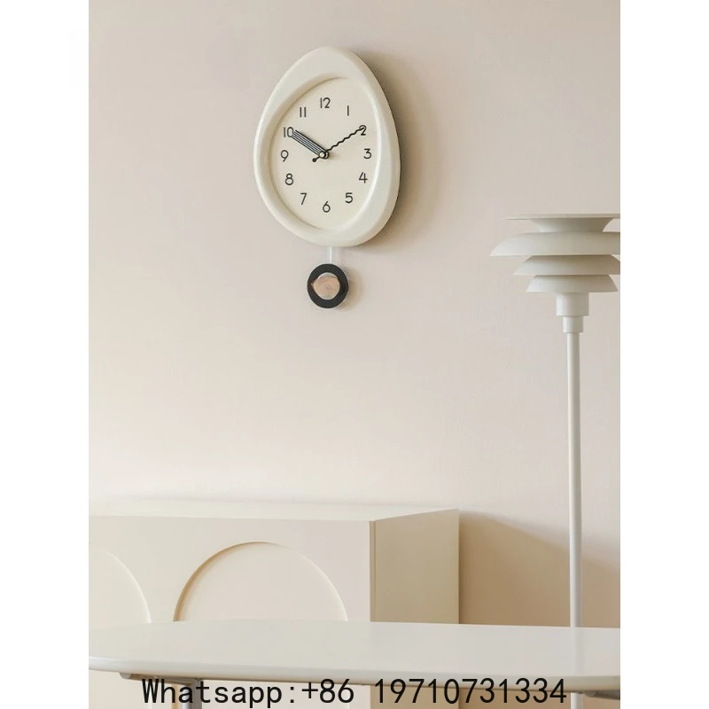 No Punching Cream Wind Living Room Clock Wall Clock
No Punching Cream Wind Living Room Clock Wall Clock