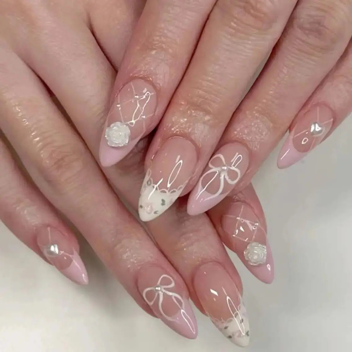 Charm White Camellia Bowknot Love Heart Pearl Long Pointed Fake Nails Art Almond False Nails Rhinestones Glitter Press on Nails
Charm White Camellia Bowknot Love Heart Pearl Long Pointed Fake Nails Art Almond False Nails Rhinestones Glitter Press on Nails
