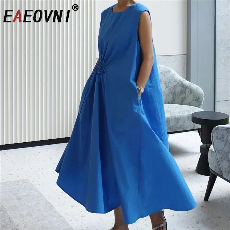 EAEOVNI Summer Minimalism Sleeveless Dress Women Solid Color O Neck Folds Drawstring Waist Loose Long Dresses 2025 1A1143
EAEOVNI Summer Minimalism Sleeveless Dress Women Solid Color O Neck Folds Drawstring Waist Loose Long Dresses 2025 1A1143