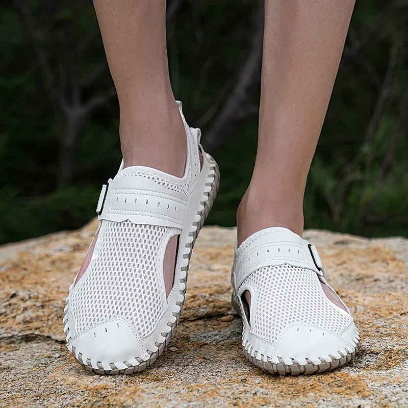 Hot sales Summer men's sandals Breathable and casual outdoorsstyle Beach stroll office men's Black and white oversized shoes
Hot sales Summer men's sandals Breathable and casual outdoorsstyle Beach stroll office men's Black and white oversized shoes