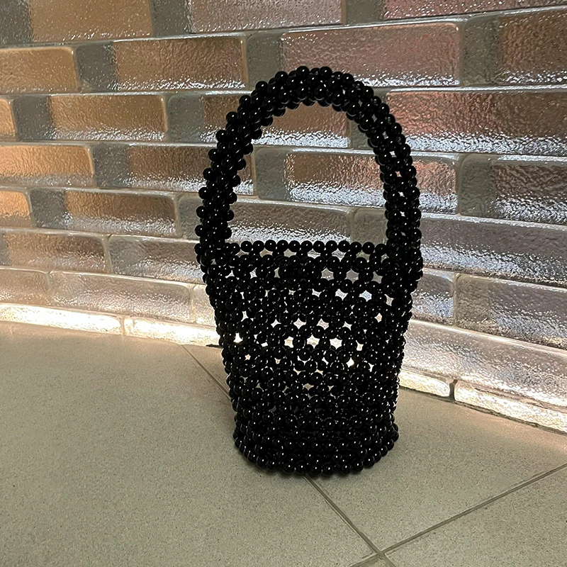 2023 New Handmade Black Beaded Woven Temperament Handbags for Women Hollow Out Designer Versatile Large Capacity Bucket Bags
2023 New Handmade Black Beaded Woven Temperament Handbags for Women Hollow Out Designer Versatile Large Capacity Bucket Bags