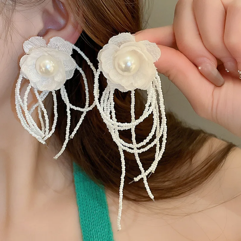 Minar Boho White Color Cloth Simulated Pearl Miyuki Treand Strand Flower Long Tassel Clip Earrings for Women Wholesale Jewelry
Minar Boho White Color Cloth Simulated Pearl Miyuki Treand Strand Flower Long Tassel Clip Earrings for Women Wholesale Jewelry