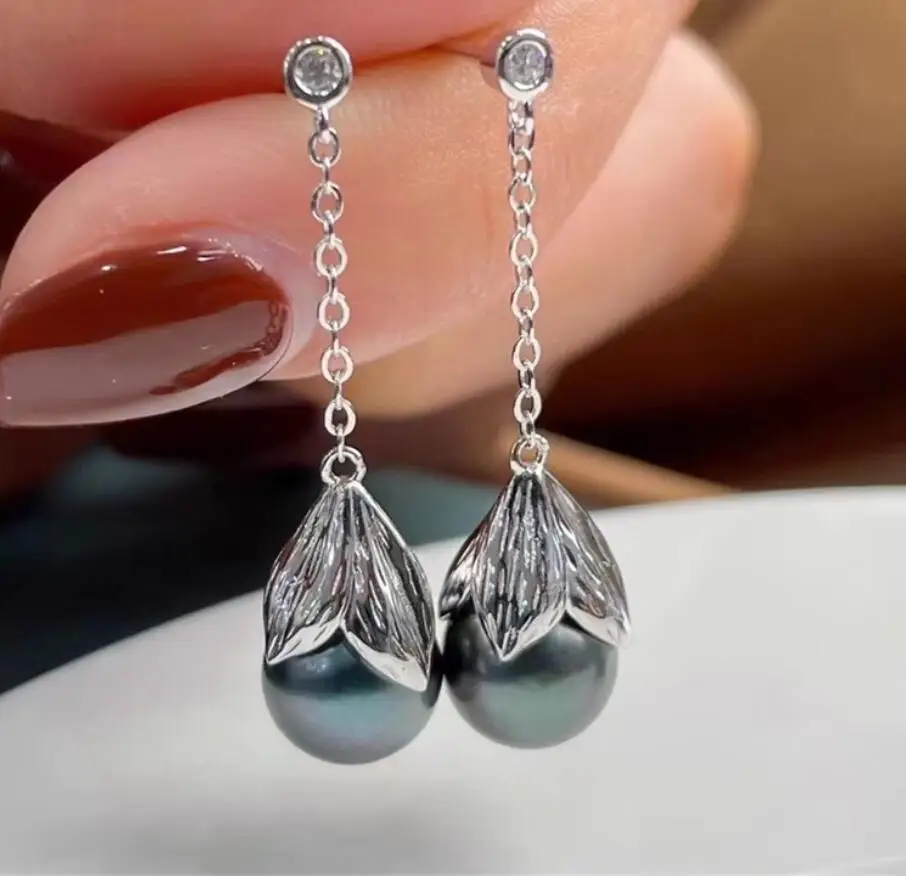 потрясающая пара натуральных черно-белых идеальных круглых жемчужных сережек Южного моря диаметром 8–9 мм с жемчугом 925-х годов
потрясающая пара натуральных черно-белых идеальных круглых жемчужных сережек Южного моря диаметром 8–9 мм с жемчугом 925-х годов