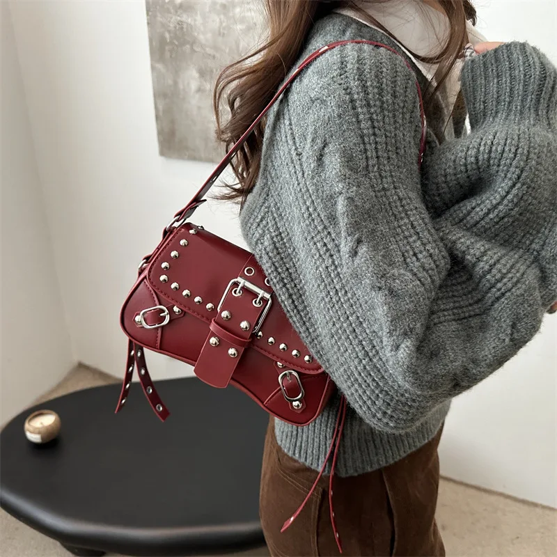 Punk style women's shoulder bag PU leather rock fashion handbag, fashionable small armpit wallet with rivets
Punk style women's shoulder bag PU leather rock fashion handbag, fashionable small armpit wallet with rivets