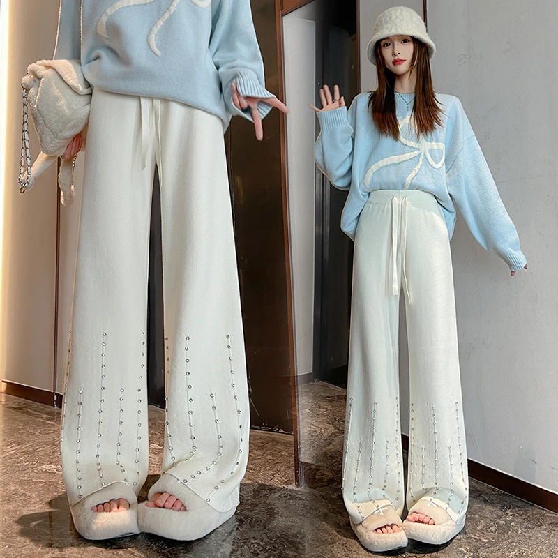 Heavy industry diamond studded knitted wide leg pants women in autumn and winter loose lazy relaxed floor length pants
Heavy industry diamond studded knitted wide leg pants women in autumn and winter loose lazy relaxed floor length pants