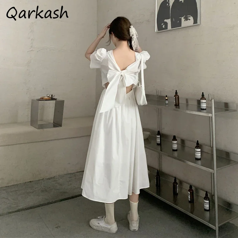 Dresses Women Chic New Summer Korean Style Puff Sleeves Hollow Back Bow Temperament Sexy Party Elegant Trendy Solid Midi Street
Dresses Women Chic New Summer Korean Style Puff Sleeves Hollow Back Bow Temperament Sexy Party Elegant Trendy Solid Midi Street