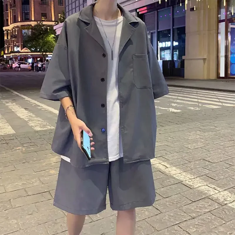 Summer Men's Sets Half Sleeve Blazer Suits Solid Short Sleeve Button Shirt + Shorts Korean Handsome Loose 2 Piece Set Outfits
Summer Men's Sets Half Sleeve Blazer Suits Solid Short Sleeve Button Shirt + Shorts Korean Handsome Loose 2 Piece Set Outfits