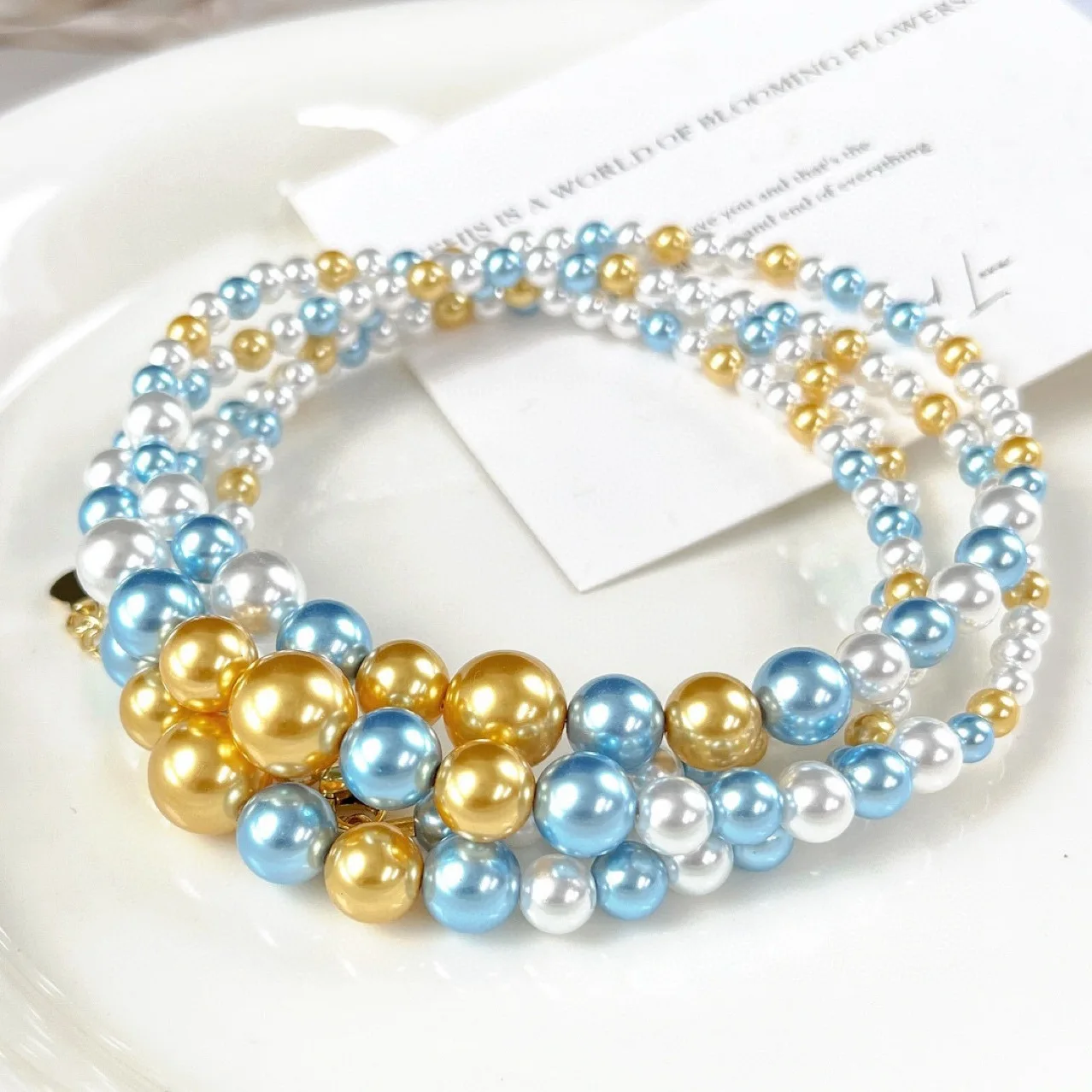 New Chinese retro high quality high gloss cold white blue enchantress warm gold gradual change color artificial pearl collarbone
New Chinese retro high quality high gloss cold white blue enchantress warm gold gradual change color artificial pearl collarbone
