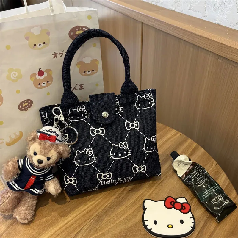 Kawaii Cute Denim Print KT Cat Handbag For Women 2025 New Fashion Shoulder Bag Messenger Bag Mini Dumpling Tag Girls Toys Gifts
Kawaii Cute Denim Print KT Cat Handbag For Women 2025 New Fashion Shoulder Bag Messenger Bag Mini Dumpling Tag Girls Toys Gifts
