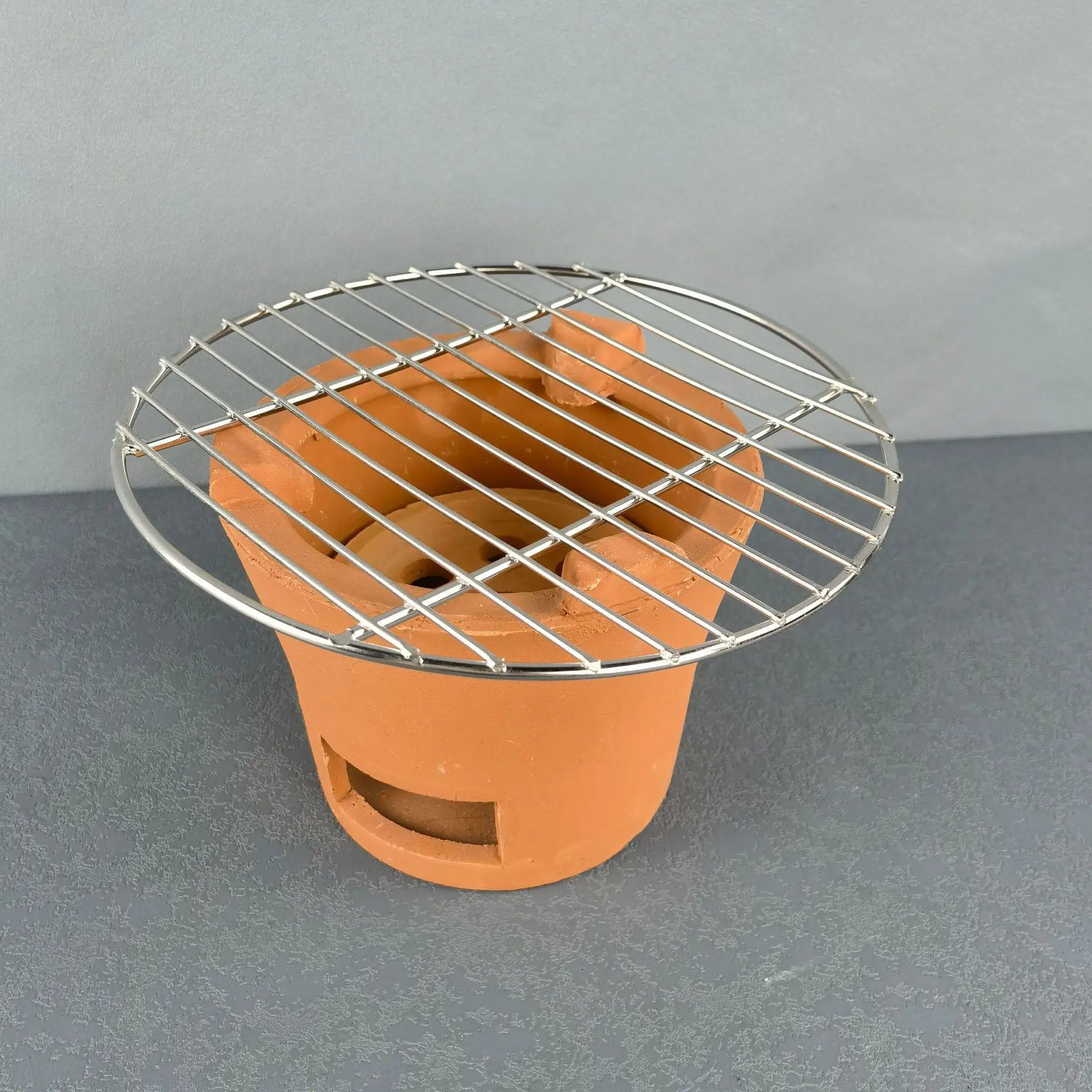 Stainless Steel Woven BBQ Grill Camping Outdoor Cooking Utensils Charcoal Stove Tea Pot Holder Integrated Network Design
Stainless Steel Woven BBQ Grill Camping Outdoor Cooking Utensils Charcoal Stove Tea Pot Holder Integrated Network Design