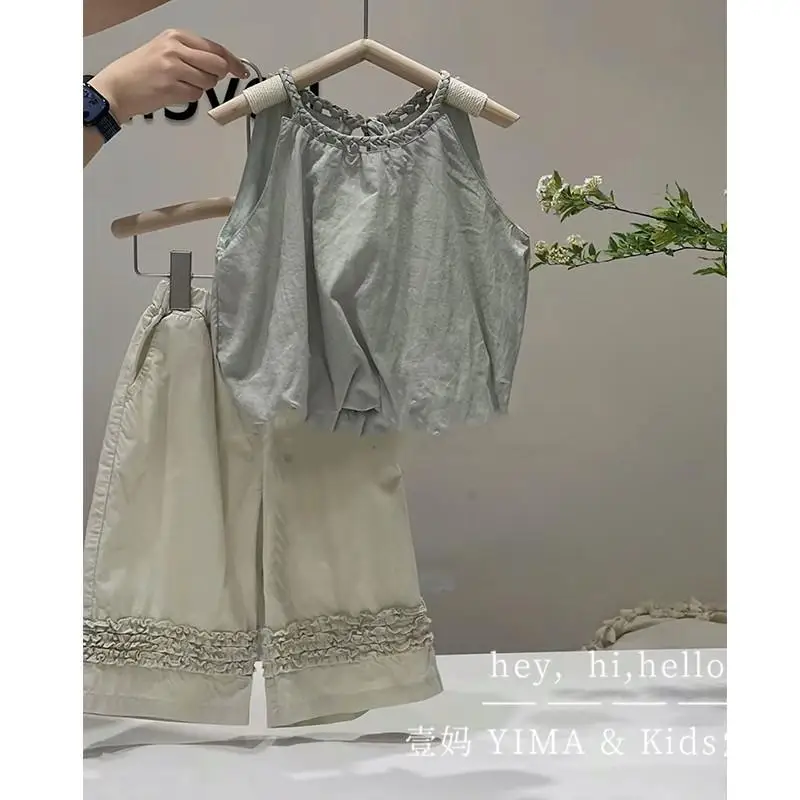 Korean 2025 children's clothing girls' vest for summer wear new baby style woven lace top children's solid color
Korean 2025 children's clothing girls' vest for summer wear new baby style woven lace top children's solid color