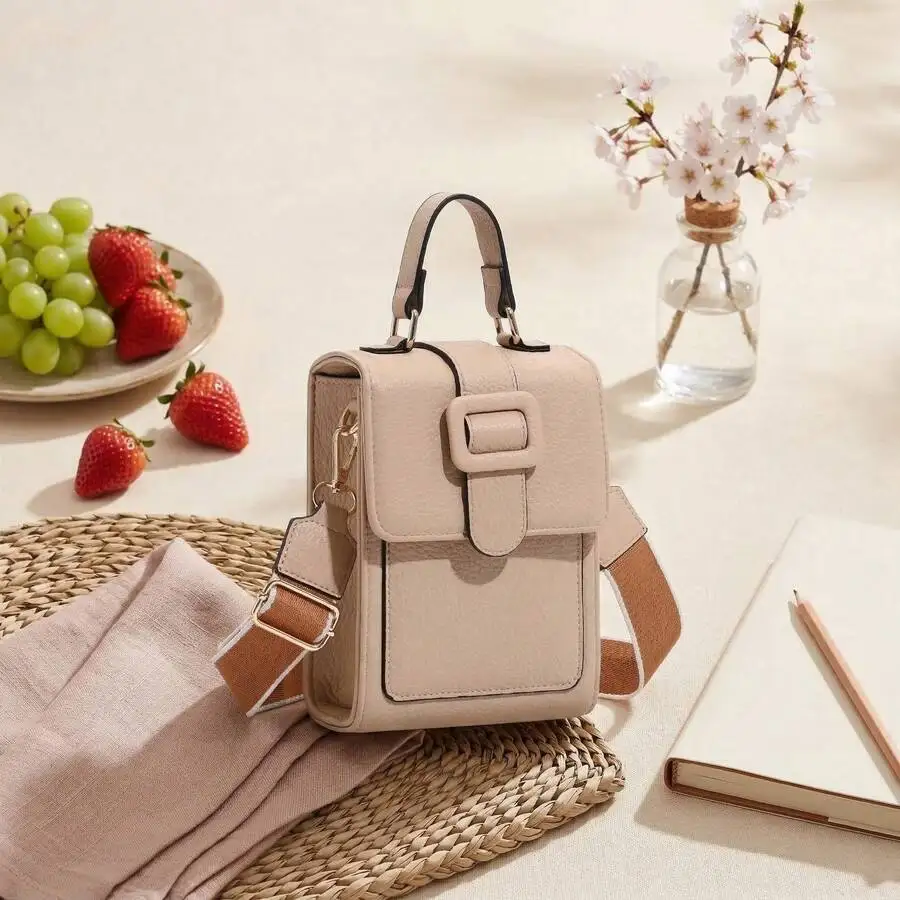 Mini Structured Crossbody Bag With Top Handle And Adjustable Strap Decorative Buckle Flip Design
Mini Structured Crossbody Bag With Top Handle And Adjustable Strap Decorative Buckle Flip Design