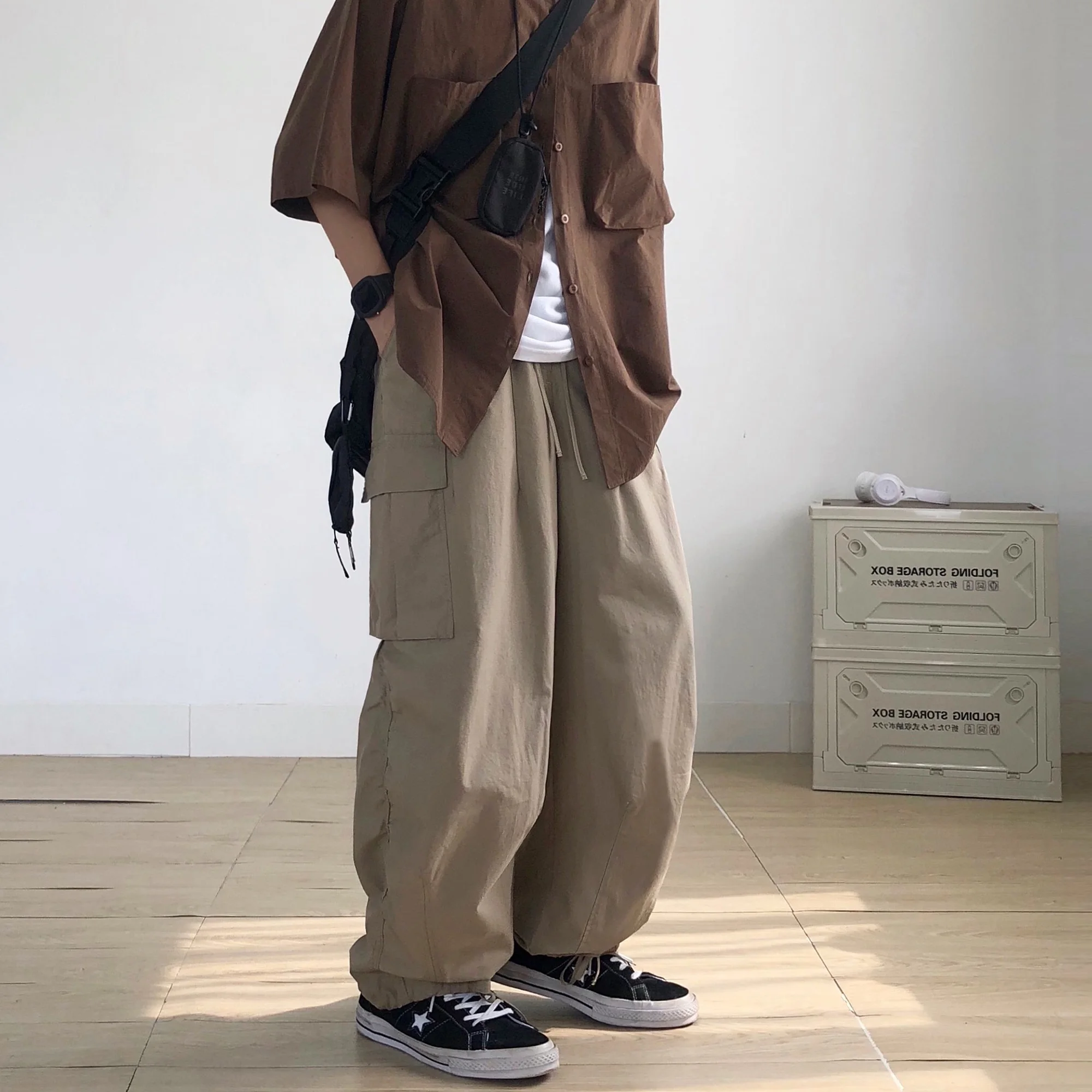 Брюки-карго цвета хаки свободного кроя с широкими штанинами и множеством карманов в винтажном американском стиле, повседневные длинные брюки для уличной моды
Брюки-карго цвета хаки свободного кроя с широкими штанинами и множеством карманов в винтажном американском стиле, повседневные длинные брюки для уличной моды