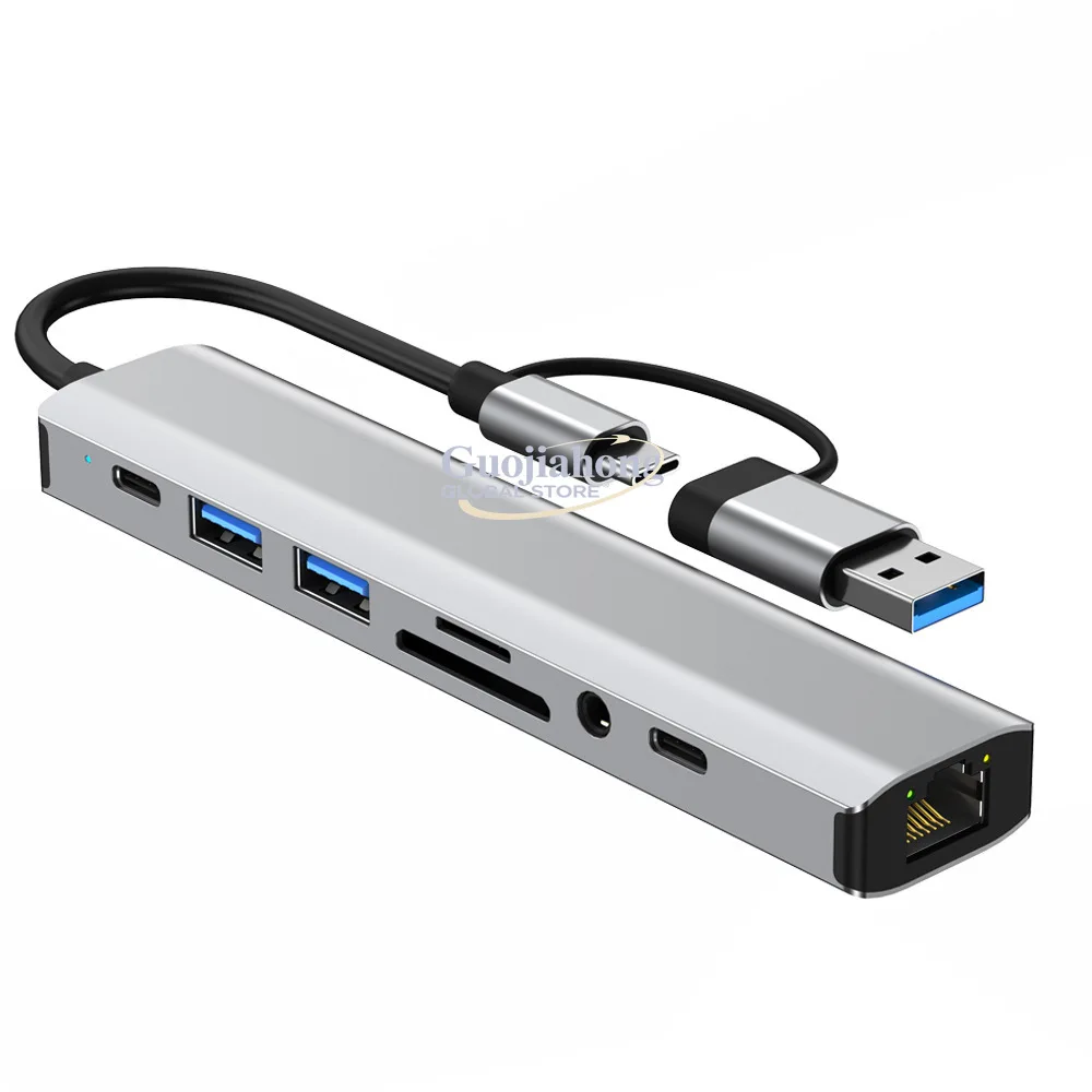 Док-станция с двумя портами Type-C, многофункциональный USB 3.0-разветвитель, сетевая карта RJ45 с адаптером SD/TF
Док-станция с двумя портами Type-C, многофункциональный USB 3.0-разветвитель, сетевая карта RJ45 с адаптером SD/TF