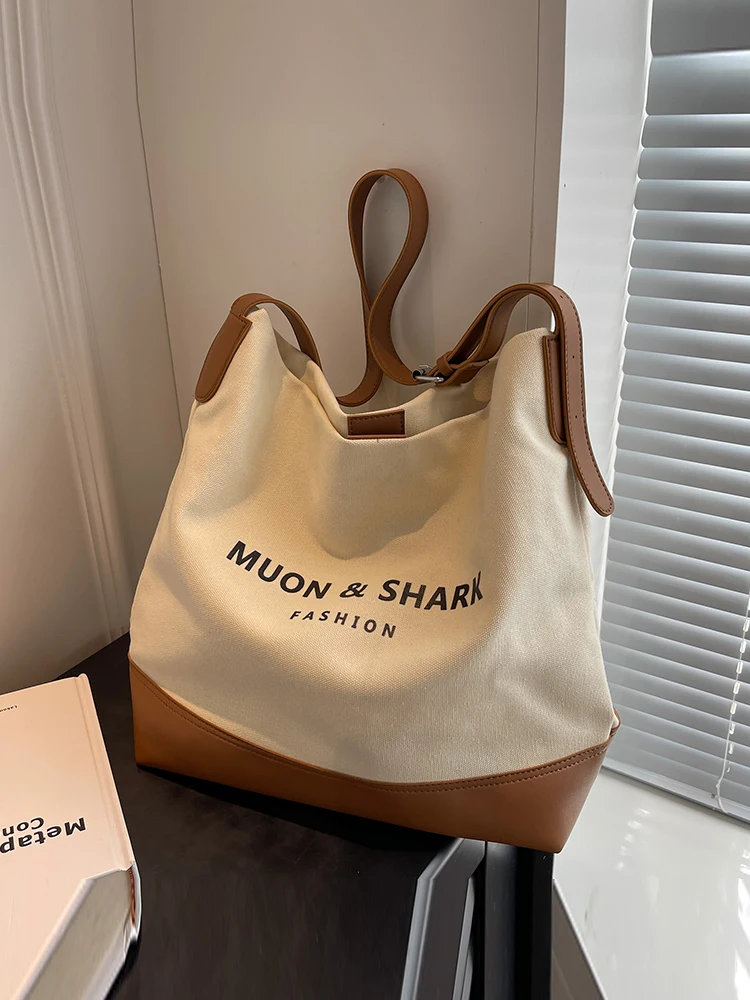 Trendy Canvas Bucket Bag Large Capacity Women's Crossbody Shoulder Bag Commuting Shopping Bag Casual Versatile Soft Handbag
Trendy Canvas Bucket Bag Large Capacity Women's Crossbody Shoulder Bag Commuting Shopping Bag Casual Versatile Soft Handbag