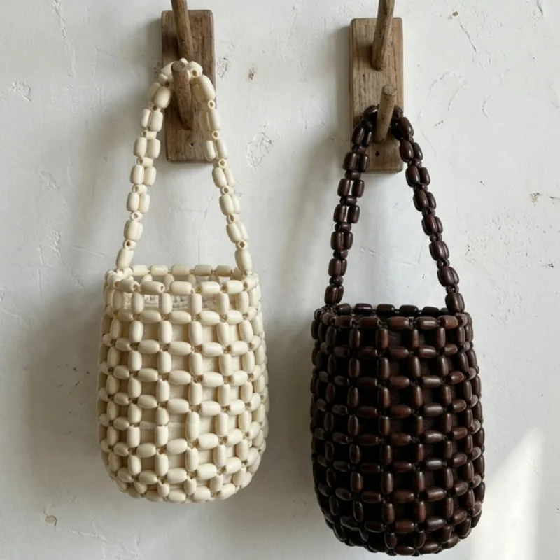 Handmade Wooden Bead Shoulder Bag With Inner Bag Retro Woven Hollowed-out Beach Handbag Exquisite Versatile Casual Shoulder Bag
Handmade Wooden Bead Shoulder Bag With Inner Bag Retro Woven Hollowed-out Beach Handbag Exquisite Versatile Casual Shoulder Bag