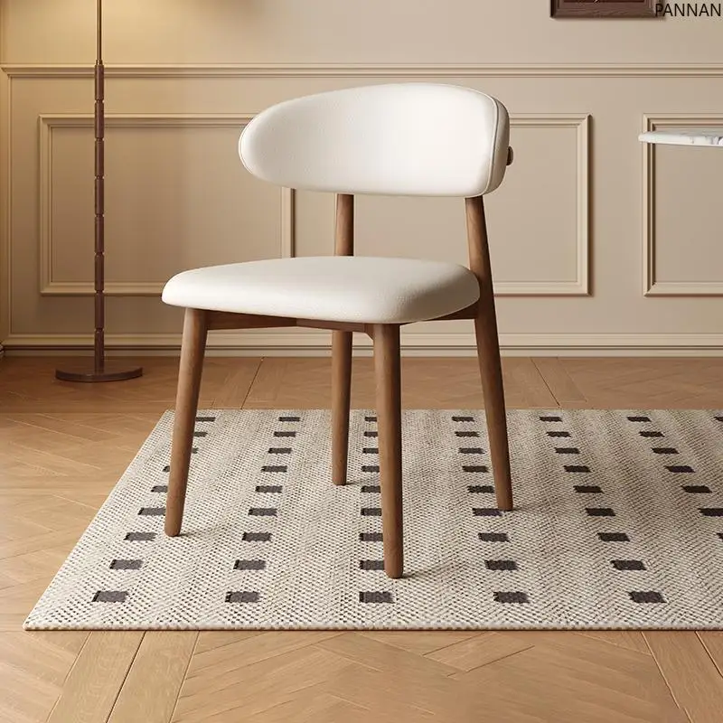 Modern simple solid wood dining chair Nordic designer soft bag backrest croissant desk and chair
Modern simple solid wood dining chair Nordic designer soft bag backrest croissant desk and chair
