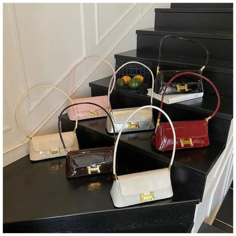 2025 Новая женская винтажная сумка через плечо, роскошная маленькая сумочка через плечо, модная минималистичная шикарная сумка, уникальный дизайнерский стиль 
2025 Новая женская винтажная сумка через плечо, роскошная маленькая сумочка через плечо, модная минималистичная шикарная сумка, уникальный дизайнерский стиль