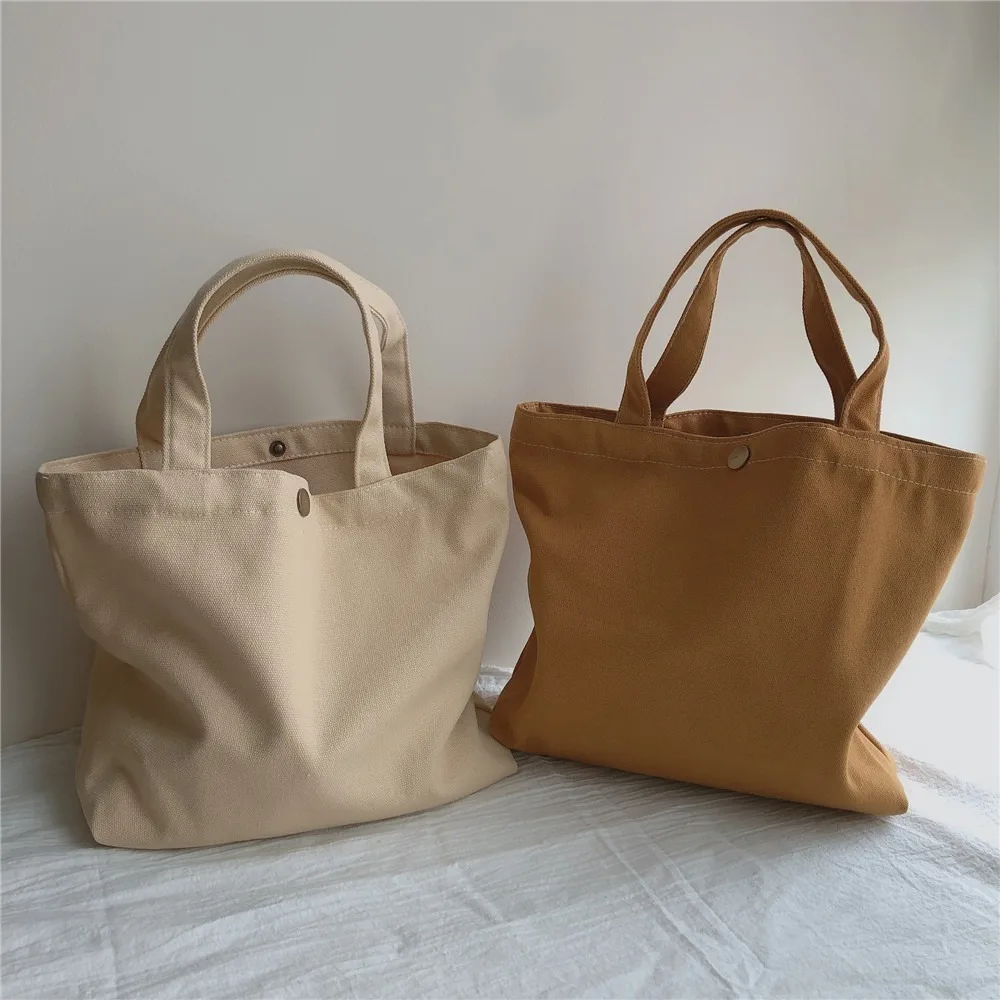 New Solid Color Canvas Bags Buckle Gifts Tote Bag Lightweight Women Handbags Ladies Tote Bag Shopping Bag Gifts
New Solid Color Canvas Bags Buckle Gifts Tote Bag Lightweight Women Handbags Ladies Tote Bag Shopping Bag Gifts