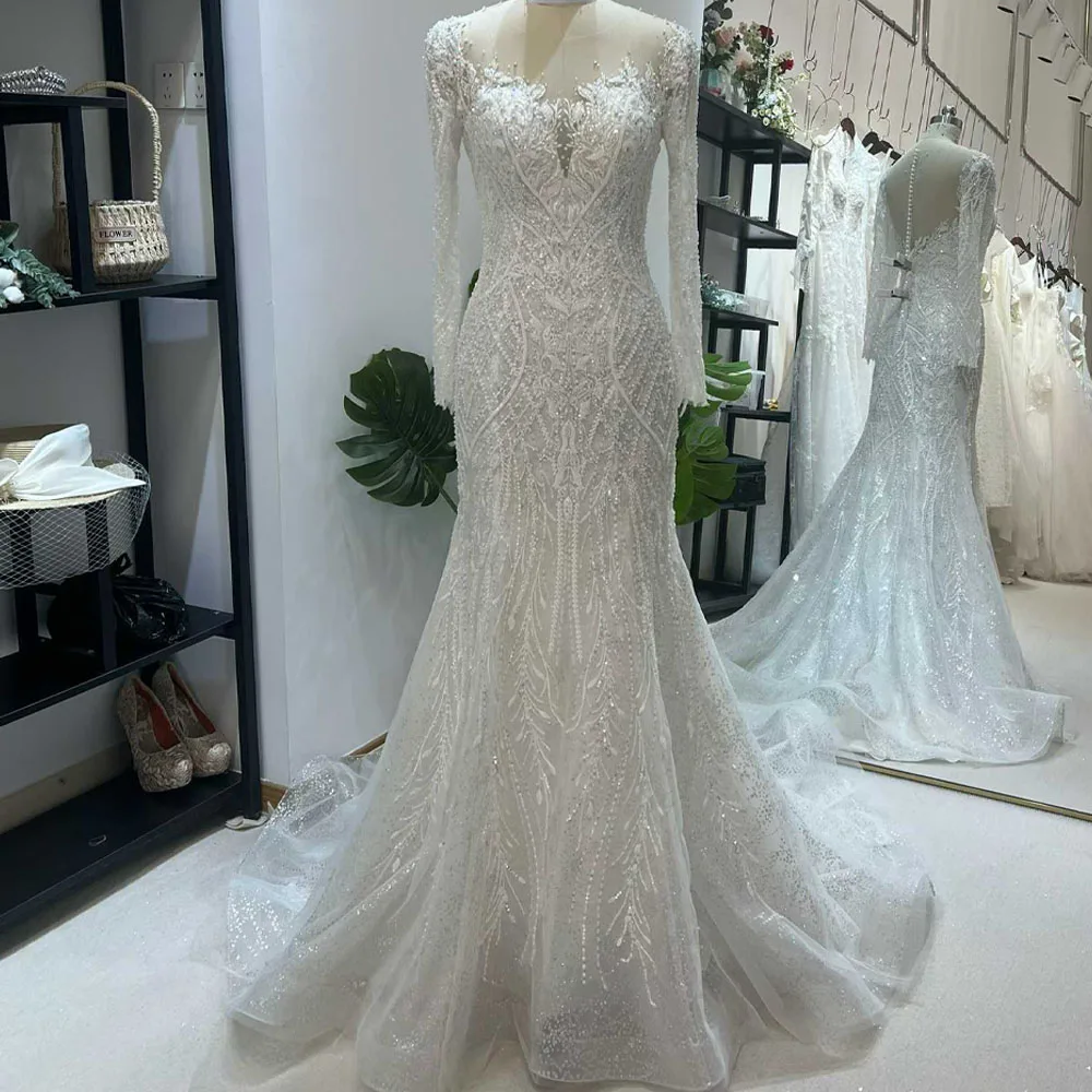 Customized O-Neck Wedding Dress with Long Sleeves Beading Embroidery Sheath Fit Bridal Gown
Customized O-Neck Wedding Dress with Long Sleeves Beading Embroidery Sheath Fit Bridal Gown