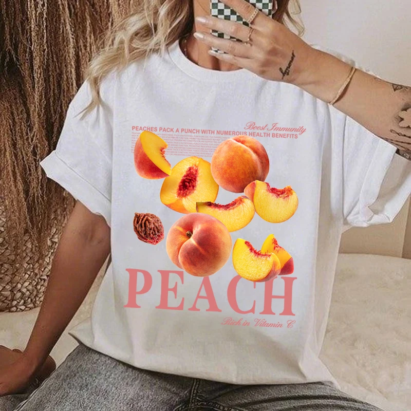 Милые футболки с рисунком фруктов и персика, винтажные футболки с принтом для женщин, свободные футболки с короткими рукавами в стиле ретро, эстетические модные топы в стиле хиппи, большие размеры 
Милые футболки с рисунком фруктов и персика, винтажные футболки с принтом для женщин, свободные футболки с короткими рукавами в стиле ретро, эстетические модные топы в стиле хиппи, большие размеры