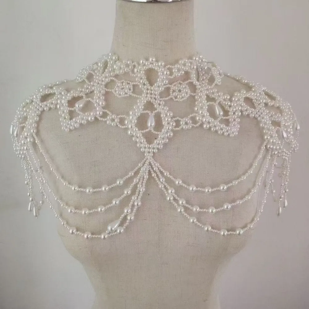 Retro Hollow Wedding Pearl Shawl Pearl Tassel Handmade Shoulder Chain Beaded Bridal Wraps Bridal Wedding Dress
Retro Hollow Wedding Pearl Shawl Pearl Tassel Handmade Shoulder Chain Beaded Bridal Wraps Bridal Wedding Dress