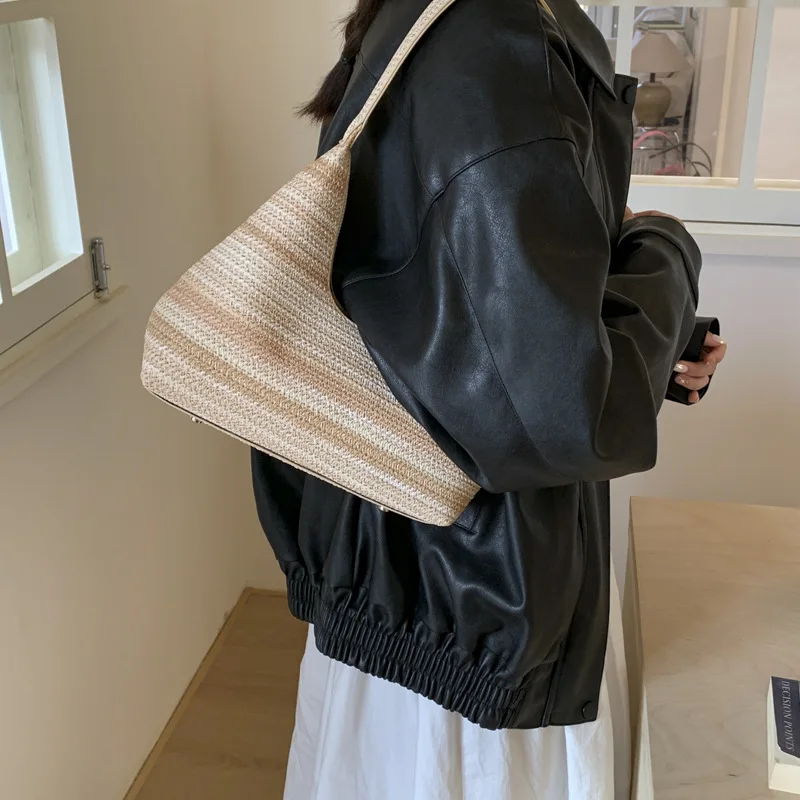 2025 New Beach Versatile Fashion Woven Handbag Women's Striped Texture Vacation Ethnic Style Casual Shopping Shoulder Bag
2025 New Beach Versatile Fashion Woven Handbag Women's Striped Texture Vacation Ethnic Style Casual Shopping Shoulder Bag