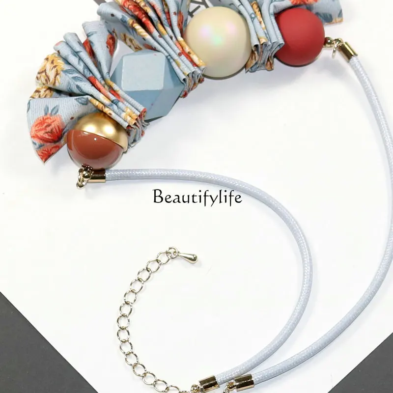 Autumn and Winter New Korean Style Temperament Wild Colorful Flowers Ribbon Accessories Floral Short Sweater Chain
Autumn and Winter New Korean Style Temperament Wild Colorful Flowers Ribbon Accessories Floral Short Sweater Chain