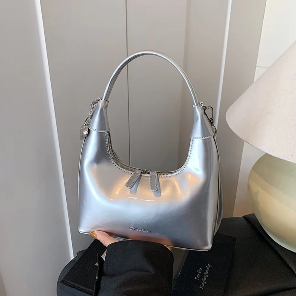 Корейская сумка-кроссбоди из искусственной кожи с подвеской в виде сердца, корейская сумка-пельмень из ПУ кожи, однотонная женская сумка на плечо
Корейская сумка-кроссбоди из искусственной кожи с подвеской в виде сердца, корейская сумка-пельмень из ПУ кожи, однотонная женская сумка на плечо