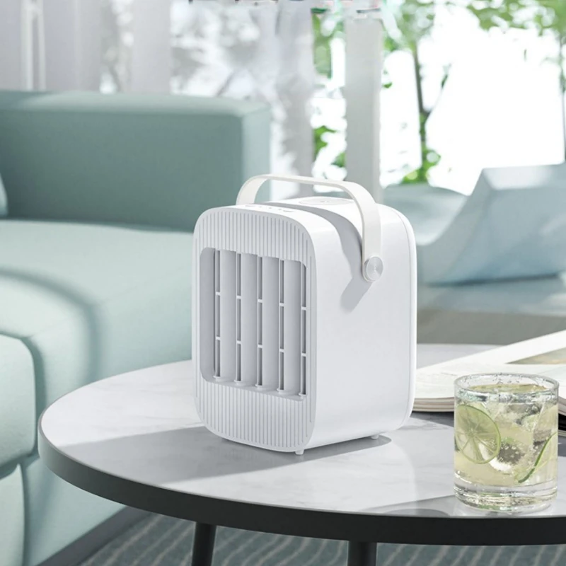 Refrigerated desktop portable mute small fan home humidifying bed fan mini water air conditioning mobile
Refrigerated desktop portable mute small fan home humidifying bed fan mini water air conditioning mobile