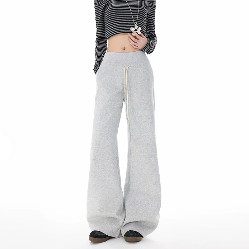 Ранняя осень, брюки с высокой талией, женские повседневные американские облегающие спортивные штаны, новые женские расклешенные брюки, широкие брюки с завязками
Ранняя осень, брюки с высокой талией, женские повседневные американские облегающие спортивные штаны, новые женские расклешенные брюки, широкие брюки с завязками