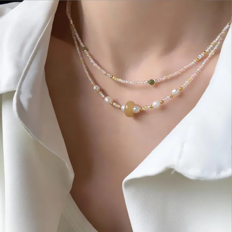 Japan and South Korea freshwater pearl yellow jade splicing millet bead necklace simple temperament versatile fresh niche
Japan and South Korea freshwater pearl yellow jade splicing millet bead necklace simple temperament versatile fresh niche