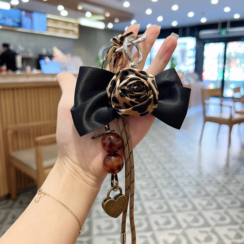 Creative Leopard Print Bead String Camellia Car Keychain Fashion Bag Hanging Accessories
Creative Leopard Print Bead String Camellia Car Keychain Fashion Bag Hanging Accessories