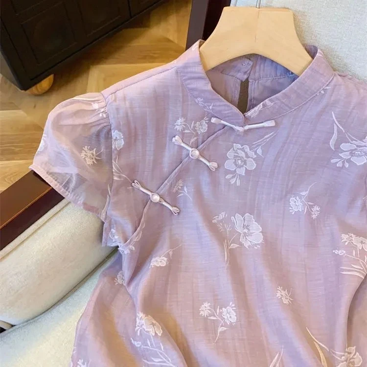 Purple new Chinese style printed short sleeved shirt for women's summer style Chinese qipao collar small top chiffon shirt
Purple new Chinese style printed short sleeved shirt for women's summer style Chinese qipao collar small top chiffon shirt