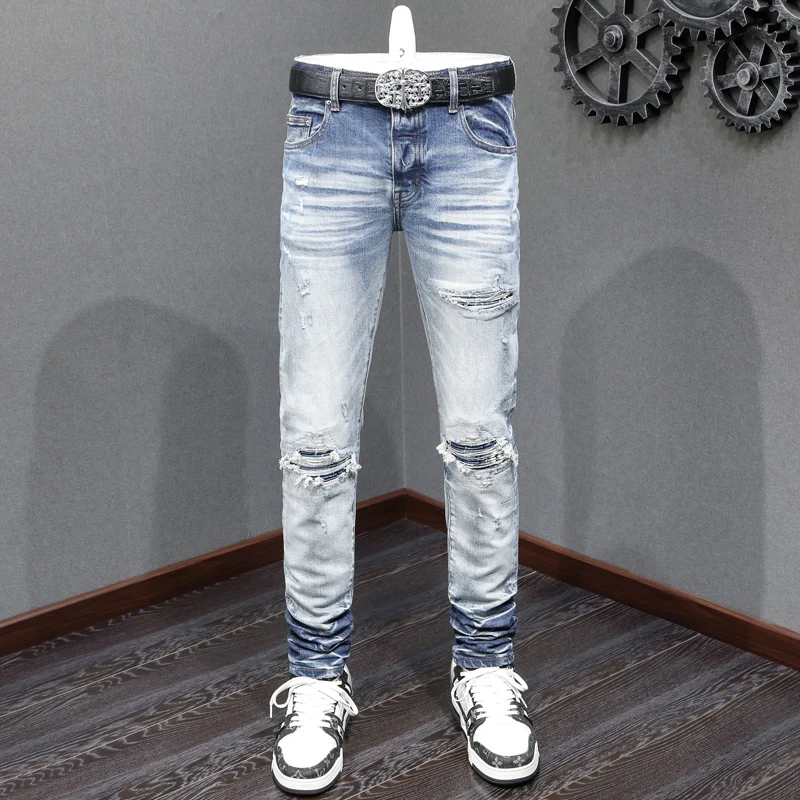 Fashionable new jeans with pleats, washed water, nostalgic stretch, slim fit, perforated patch, light blue jeans, high street hi
Fashionable new jeans with pleats, washed water, nostalgic stretch, slim fit, perforated patch, light blue jeans, high street hi