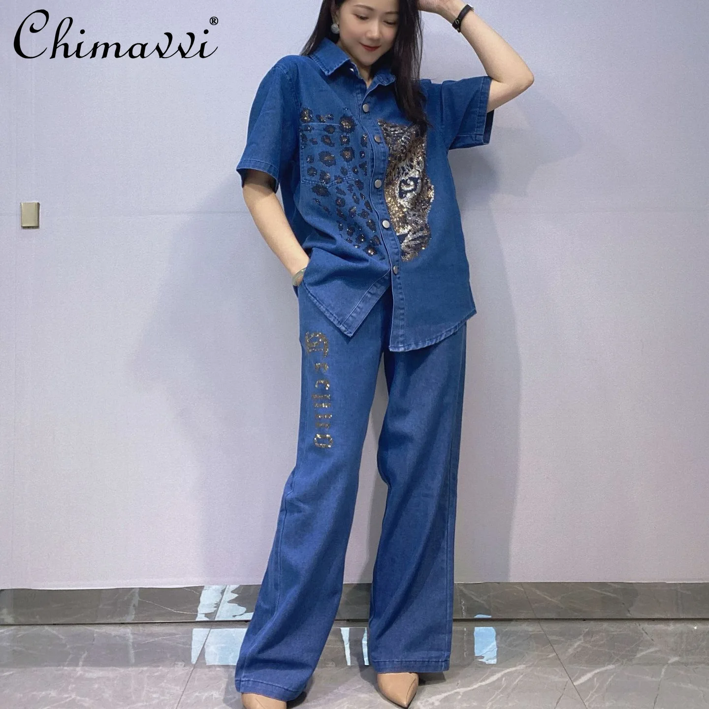 Fashion Large Size Womens Denim Suit Heavy Diamond Short Sleeve Shirt High Waist Skinny Wide Leg Pants High Street Two-piece Set
Fashion Large Size Womens Denim Suit Heavy Diamond Short Sleeve Shirt High Waist Skinny Wide Leg Pants High Street Two-piece Set
