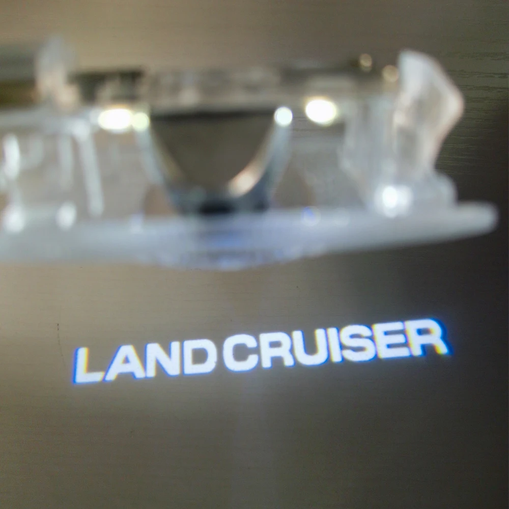 Land Cruiser Badge Shadow Light 2 шт. автоматический призрачный свет для Toyota Land Cruiser LC300 LC200 2009-2023 Toyota дверной светильник
Land Cruiser Badge Shadow Light 2 шт. автоматический призрачный свет для Toyota Land Cruiser LC300 LC200 2009-2023 Toyota дверной светильник