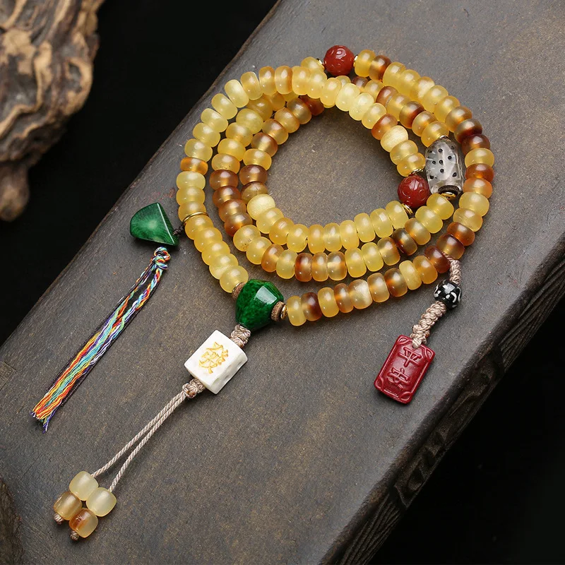 Natural Golden-Shelled Pearl-Backed Mountain Tortoise 108-Bead Multi-strand Bracelet with Cloud Agate and Cinnabar Accents
Natural Golden-Shelled Pearl-Backed Mountain Tortoise 108-Bead Multi-strand Bracelet with Cloud Agate and Cinnabar Accents