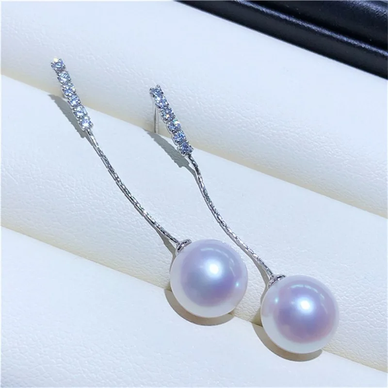 Стильные простые серьги премиум-класса AAAA + 11-10 мм с натуральным белым круглым жемчугом Akoya, серебро 925 пробы 
Стильные простые серьги премиум-класса AAAA + 11-10 мм с натуральным белым круглым жемчугом Akoya, серебро 925 пробы