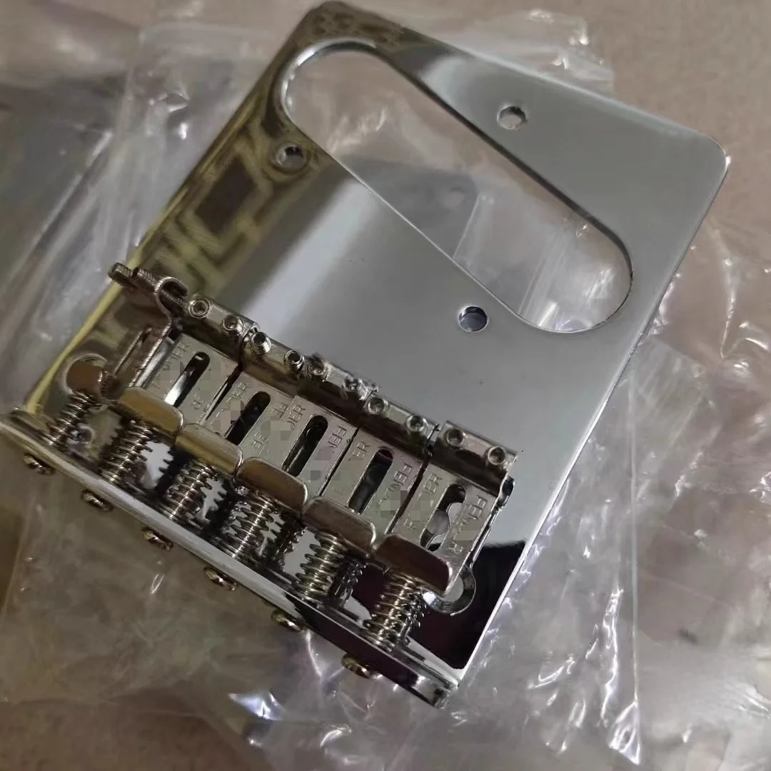 New Tele Electric Guitar Tailpiece Folding Single-sided Fixed Bridge Bridge with Screw Wrench
New Tele Electric Guitar Tailpiece Folding Single-sided Fixed Bridge Bridge with Screw Wrench