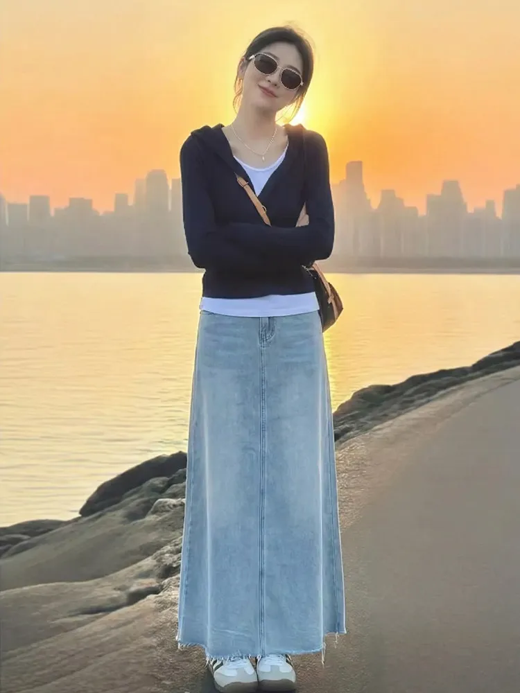 Новая женская джинсовая юбка А-силуэта с высокой талией в американском ретро-стиле, больших размеров, облегающая, длинная, синяя, с бахромой, повседневная, весна
Новая женская джинсовая юбка А-силуэта с высокой талией в американском ретро-стиле, больших размеров, облегающая, длинная, синяя, с бахромой, повседневная, весна