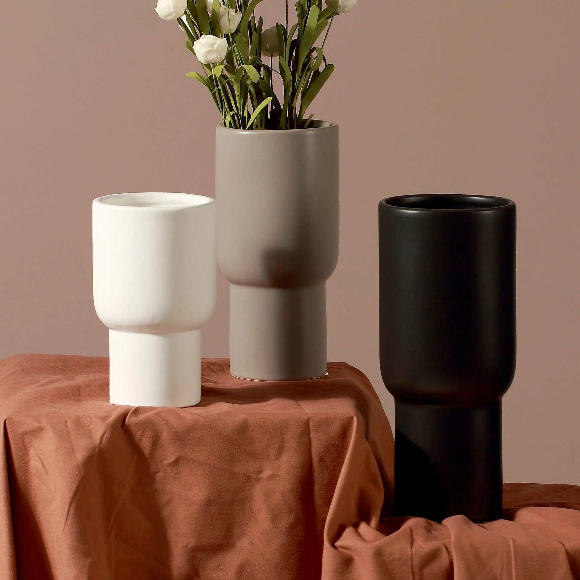 Modern simple matte black and white gray pottery vase home soft decoration decoration dried flower arranger geometric figures
Modern simple matte black and white gray pottery vase home soft decoration decoration dried flower arranger geometric figures